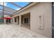 Covered patio with outdoor shower, tiled floor, and access to the screened pool and spa area at 5703 Tanagerside Rd, Lithia, FL 33547