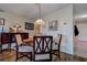 Comfortable dining area featuring a round table and chairs with accent lighting at 5920 80Th N St # 107, St Petersburg, FL 33709