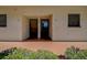 The entryway of unit 107 and 108, with a well-maintained front porch at 5920 80Th N St # 107, St Petersburg, FL 33709