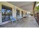 Cozy patio area with comfortable seating, perfect for enjoying the outdoor ambiance at 5920 80Th N St # 107, St Petersburg, FL 33709