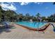 Inviting community pool area with ample seating, perfect for relaxation and recreation at 5920 80Th N St # 107, St Petersburg, FL 33709