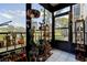 Bright sunroom with multiple plants and tranquil outdoor views, creating a relaxing space at 5920 80Th N St # 107, St Petersburg, FL 33709