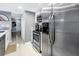 Bright kitchen with stainless steel appliances and a functional layout for seamless cooking experiences at 6902 El Centro Ct, Tampa, FL 33634