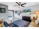 Cozy living room featuring comfortable sofas, stylish decor, and a peaceful ambiance at 6902 El Centro Ct, Tampa, FL 33634