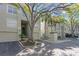 Townhouse exterior showcasing well-maintained landscaping, garage, and architectural details at 732 Coral Reef Dr # 732, Tampa, FL 33602