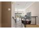 Hallway with views of an open living space and stairwell at 732 Coral Reef Dr # 732, Tampa, FL 33602