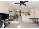 Bright living area showcasing an open floor plan with views of the kitchen and dining space at 732 Coral Reef Dr # 732, Tampa, FL 33602