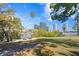 Picturesque park with waterfront views, picnic areas, lush greenery and a backdrop of the city skyline at 732 Coral Reef Dr # 732, Tampa, FL 33602