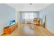 Cozy living room with wood floors and ample natural light at 8457 Deauville # 8457, Pinellas Park, FL 33781