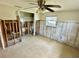 Bright bedroom with tile floors and a window offers space and natural light at 8537 Horizon Ln, Hudson, FL 34667