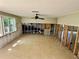 Spacious living room features tile flooring and potential for an open floor plan at 8537 Horizon Ln, Hudson, FL 34667