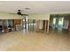Spacious living room features tile flooring and potential for an open floor plan at 8537 Horizon Ln, Hudson, FL 34667