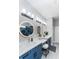 Contemporary bathroom with double sinks, sleek vanity, and ample lighting at 901 Eagle Ln, Apollo Beach, FL 33572