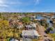 Aerial view of the property showcasing its location near a canal and waterway at 921 7Th Nw St, Largo, FL 33770