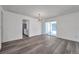 Open living area boasts modern flooring, bright walls, and a view of the lanai at 921 7Th Nw St, Largo, FL 33770