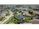 Beautiful aerial view of a Primary-planned community with lush landscaping and picturesque lakes at 6927 Crestpoint Dr, Apollo Beach, FL 33572