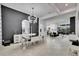 Open-concept living space featuring a dining area with statement lighting and modern decor at 6927 Crestpoint Dr, Apollo Beach, FL 33572
