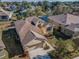 Stunning aerial view of the home's backyard, and water views, showcasing its premier location at 1010 Blue Heron Way, Tarpon Springs, FL 34689