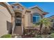 Charming single-story home with a beautifully landscaped front yard and inviting entryway at 1010 Blue Heron Way, Tarpon Springs, FL 34689