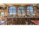 Full bar and seating area with multiple windows overlooking the grounds at 1020 New Winsor Loop # 46, Sun City Center, FL 33573