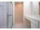 Bathroom with glass shower, vanity, and updated fixtures at 1020 New Winsor Loop # 46, Sun City Center, FL 33573