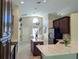 Spacious kitchen with marble countertops, stainless steel appliances, and an eat-in area at 1032 S Pointe Alexis Dr, Tarpon Springs, FL 34689