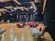 A large ballroom with tables, chairs, a stage, and lots of lighting at 1034 Mcdaniel St # 1034, Sun City Center, FL 33573