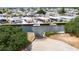 Stunning aerial view of waterfront community with boat docks and easy water access at 105 W Saint Johns Way, Apollo Beach, FL 33572