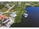 Aerial view of a waterfront home featuring a private dock and waterfront access, perfect for boaters at 107 6Th Nw St, Ruskin, FL 33570