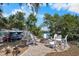 Outdoor fire pit area with seating, perfect for entertaining and enjoying waterfront views at 107 6Th Nw St, Ruskin, FL 33570