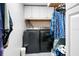 Efficient laundry room with modern washer and dryer at 107 6Th Nw St, Ruskin, FL 33570