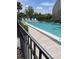 Community pool area featuring ample seating, perfect for enjoying sunny days and outdoor recreation at 111 Woodland Pl, Osprey, FL 34229