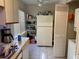 Functional kitchen with essential appliances, ample counter space, and storage solutions at 11450 Harbor Way # 5002, Largo, FL 33774