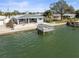 Stunning waterfront home with private boat dock and beautiful exterior at 1445 Corey S Way, South Pasadena, FL 33707