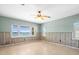 Spacious living room with large windows offering a beautiful waterfront view at 1445 Corey S Way, South Pasadena, FL 33707