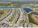 Expansive aerial view of a residential community with ponds and lush green spaces at 14637 Red Castle Ave, Lithia, FL 33547