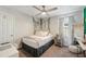 Comfortable bedroom featuring a decorative ivy accent and stylish decor at 14637 Red Castle Ave, Lithia, FL 33547