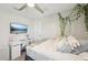 Inviting bedroom with a dedicated workspace and serene decor at 14637 Red Castle Ave, Lithia, FL 33547