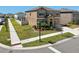 Two-story home with well-maintained landscaping and inviting entryway at 14637 Red Castle Ave, Lithia, FL 33547