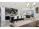 Spacious kitchen with a large island, seating for four, stainless steel appliances, and sleek countertops at 14637 Red Castle Ave, Lithia, FL 33547