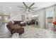 Relaxing living room featuring comfortable seating, neutral tones, and an entertainment center for a cozy atmosphere at 14637 Red Castle Ave, Lithia, FL 33547