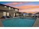 Backyard pool with lounge seating, perfect for relaxing and entertaining with ample room to enjoy the outdoors at 14637 Red Castle Ave, Lithia, FL 33547