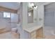 This bright bathroom features a vanity with a makeup counter at 1508 W Del Webb Blvd, Sun City Center, FL 33573