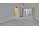 Spacious living room with sliding glass doors leading to the lanai and a closet at 1508 W Del Webb Blvd, Sun City Center, FL 33573