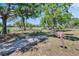 Pathway leading to a serene nature trail, offering a peaceful escape into the lush natural surroundings at 1508 W Del Webb Blvd, Sun City Center, FL 33573