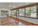 This sunroom features tile flooring and lots of natural light at 1508 W Del Webb Blvd, Sun City Center, FL 33573