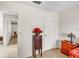 Bright bedroom with wood-look floors, doors and furniture, providing a comfortable space at 230 Lotus Dr, Safety Harbor, FL 34695