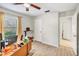Home office featuring desk, with a window, and neutral colored walls at 230 Lotus Dr, Safety Harbor, FL 34695