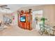 This open-concept living room features a dining area and kitchen access at 230 Lotus Dr, Safety Harbor, FL 34695
