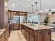 Kitchen features stainless appliances, granite counters, custom cabinetry, and mosaic backsplash at 2823 St Croix Dr, Clearwater, FL 33759